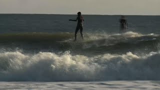 Presidential candidate Tulsi Gabbard goes surfing [upl. by Graehl]