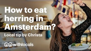 🇳🇱 Amsterdam local tip  Dutch food challenge how to eat a herring the Dutch way 🎣 [upl. by Enyala]