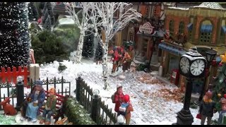 Christmas Village Displays  with Lemax houses Department 56 models trees snowmen and figurines [upl. by Biddy753]